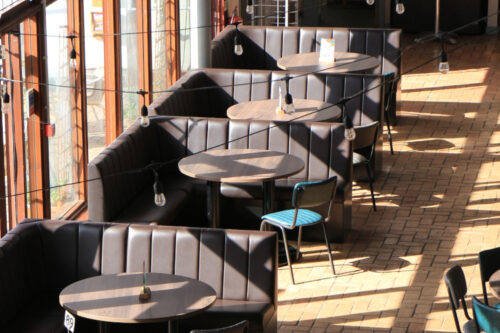 Bench seating, dining chairs and tables from a birds eye view.