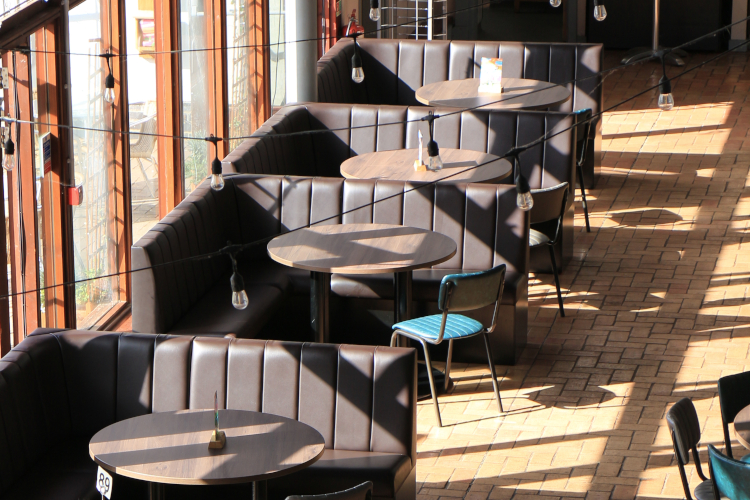 Bench seating, dining chairs and tables from a birds eye view.