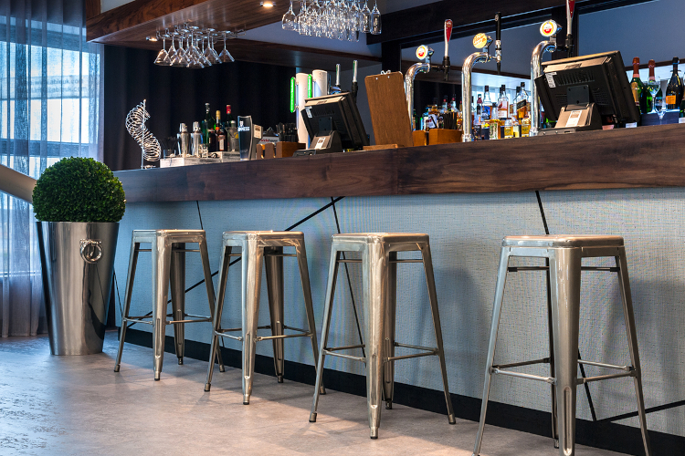 french bistro bar stools at bar