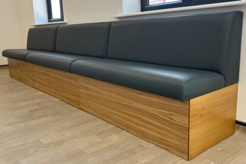 p1533-plain-back-cosmopolitan-bench-seating-with-light-oak-wood-stain-lrct-vets-3.jpg