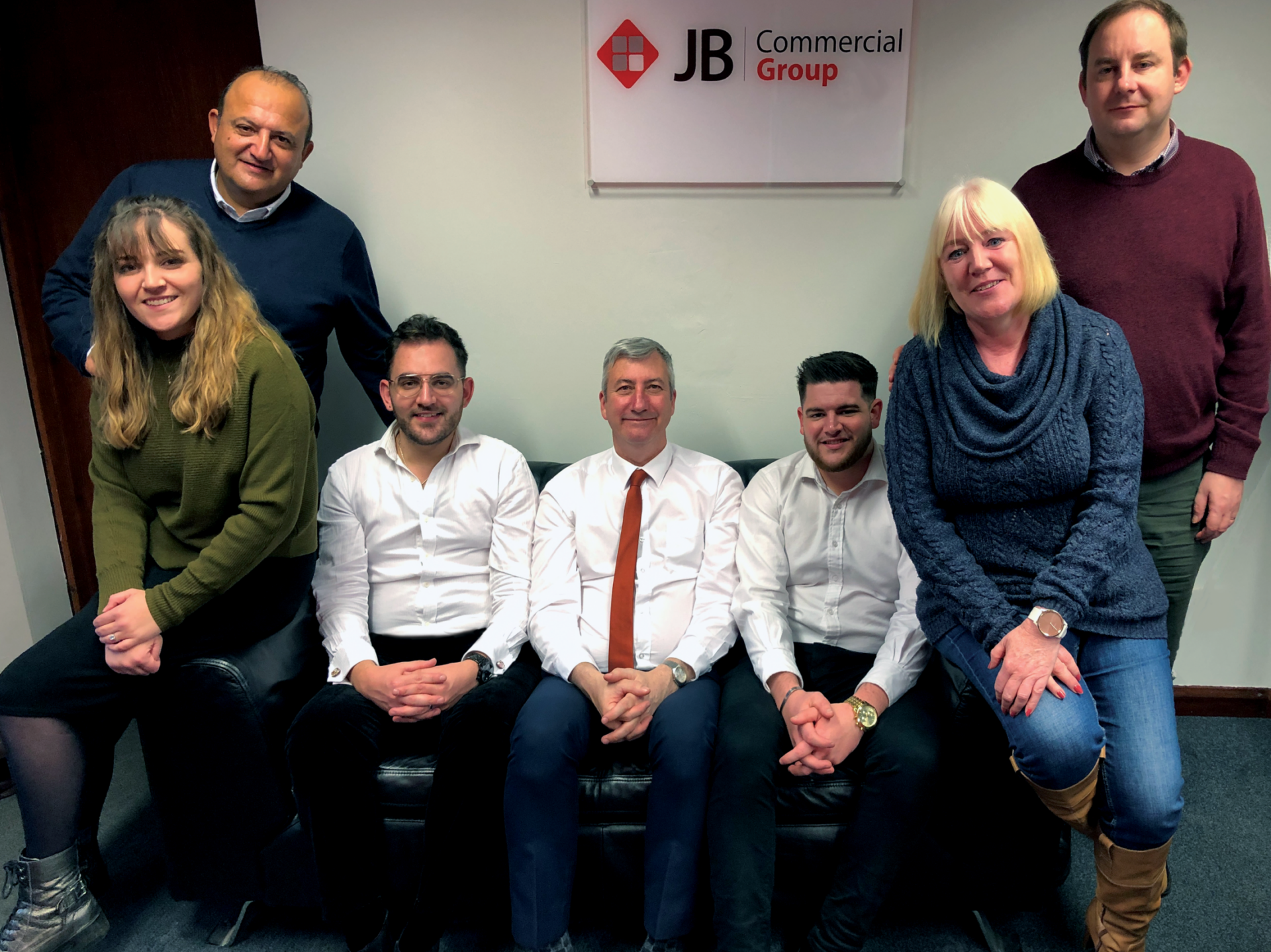 A team photo showing staff at JB Commercial